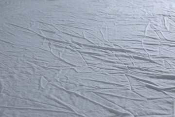 Crumpled white fabric as background, closeup view