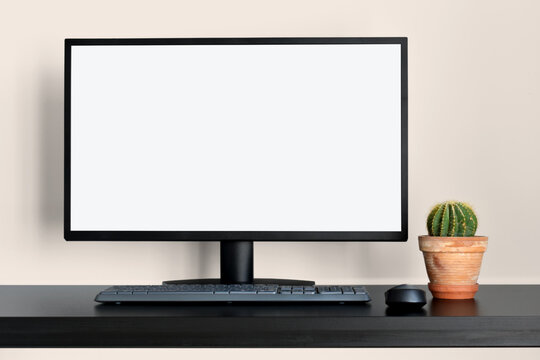 Modern light neutral office with empty computer desktop mockup for display your graphic design