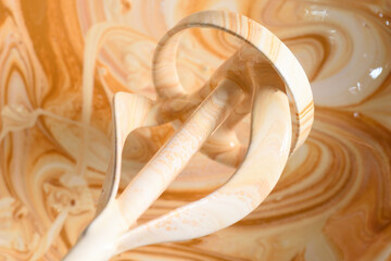 Paint mixer, industrial paint mixing, beige white paint.