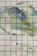 checkered paper texture, watercolor drops, abstract background.