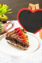 dessert is arranged in front of a heart shaped chalkboard