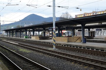 Fototapeta na wymiar Lovosice, Czechia - April 16, 2023: train station and Lovos hill