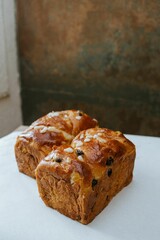Freshly baked bread on a white surface