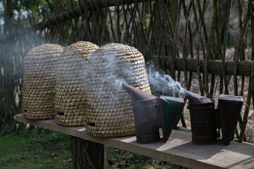 An ancient apiary with traditional straw hives.
