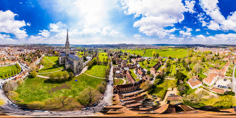 Aerial 360 VR panorama of Salisbury Cathedral and surroundings under a sunny blue sky	