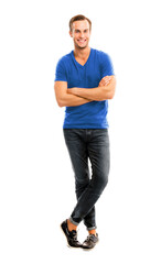 Full body, growth length portrait image of happy smiling handsome man with folded hands, wear in...