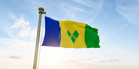 Flag of Saint Vincent waving in the wind, sky and sun background. St Vincent and the Grenadines flag. 3D rendering realistic waving flag background. 
