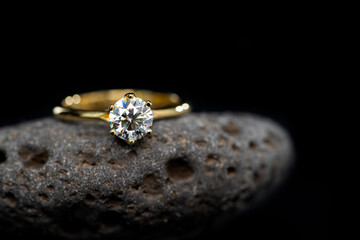 Diamond Ring on Black Stone