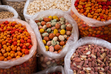 Bags of nuts for sale, snacks on market