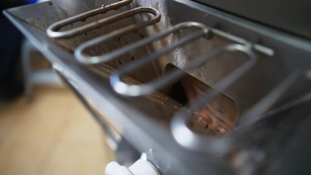 Closeup of a freezer with ice cream making in process fan rotating ice cream formula. High quality 4k footage