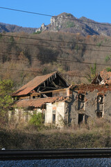 Abandoned house in mountains crumbles