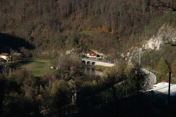 Railway along river in a valley