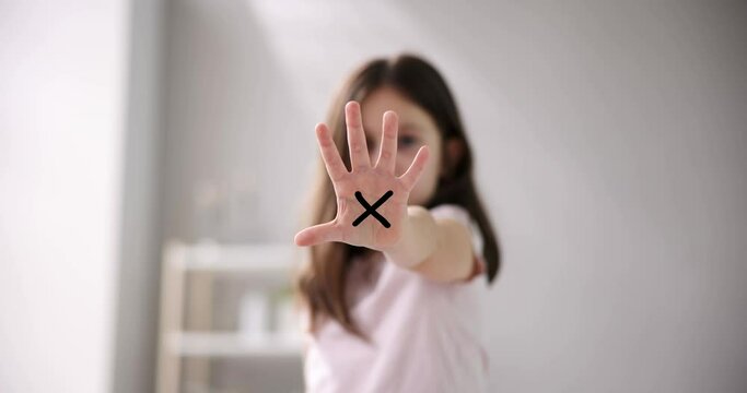 Close-up Of A Girl's Hand Showing Stop