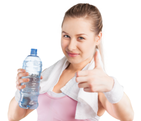 Young woman drinking water after work out