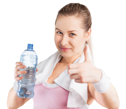 Young woman drinking water after work out