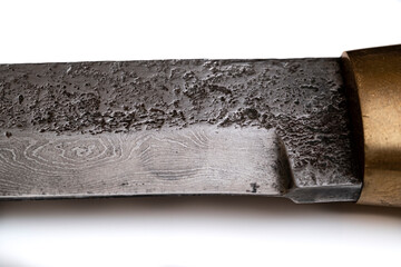 Background with a pattern of Damascus steel. Macro shot of damascus
knife texture. Damascus steel with original pattern. Damascus steel pattern.