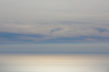Abstract image of the sky with clouds over the sea