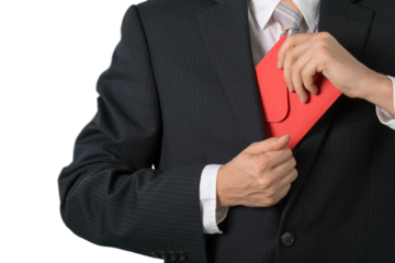 Businessman Putting an Envelope in his Pocket