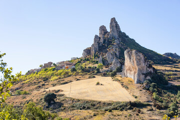 Obraz na płótnie Canvas a view of Cellorigo village behind big boulders, province of La Rioja, Spain