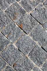Old stone pavement in retro style close up