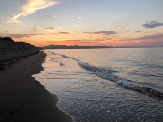 playa, mar, cerros, atardecer.