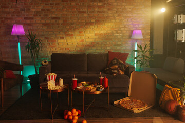 A retro living room with fast food.