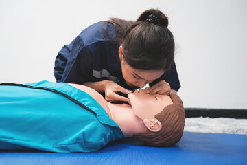 CPR Training ,Emergency and first aid class on cpr doll, Cardiopulmonary resuscitation, One part of the process resuscitation on unconscious person.