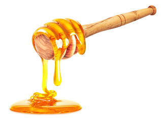 honey dripping with dipper isolated on white