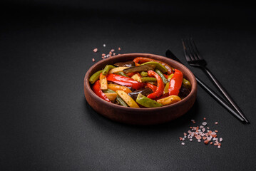 Fototapeta na wymiar Delicious vegetables steamed peppers, asparagus beans and potatoes