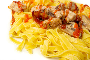 Traditional Italian Egg Pasta, Fettuccine with Chicken, Yellow Pasta with Meat and Tomato Sauce on White