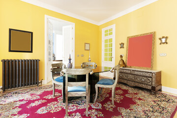An eclectic style living room with a large oriental rug