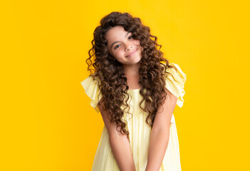 Happy teenager portrait. Cute preteen girl head shot. Child portrait on isolated background. Beautiful teenager face. Smiling girl.