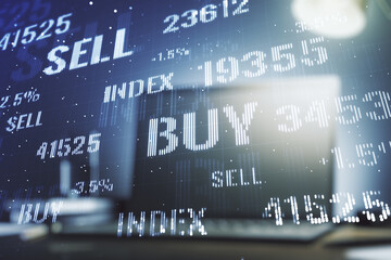 Obraz premium Abstract creative financial graph on modern laptop background, forex and investment concept. Multiexposure