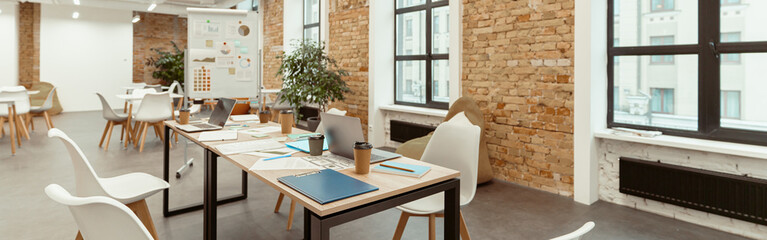 Empty work room in modern coworking in loft style