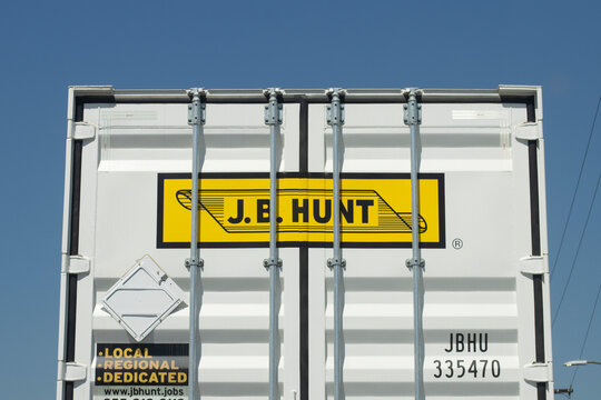 Los Angeles, CA, USA - May 13, 2022: Closeup of the J. B. Hunt logo seen on the back of a delivery truck. J.B. Hunt Transport Services, Inc. is an American transportation and logistics company.