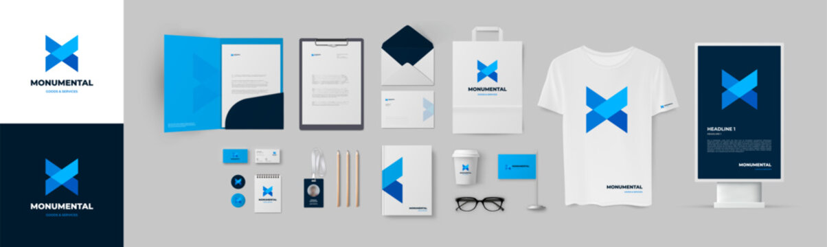 Blue corporate branding template. Presentation of corporate identity design with folder, envelope, business cards and A4 form. Geometric minimal blue logo and color dark blue background. Vector set.