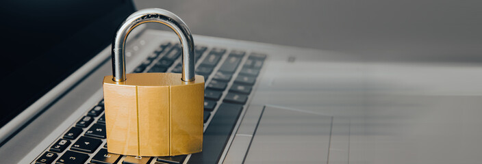 Padlock on a laptop computer keyboard.