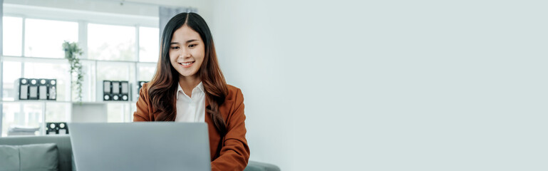 Online consulting with laptop in office of asian thai japanese chinese female exclusive lawyer legal advisor, legislation, saleswoman, legal contract documents