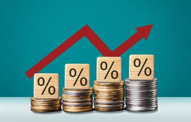 inflation concept, arrow and wooden cubes with percent sign