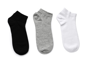 Different socks isolated on white, top view