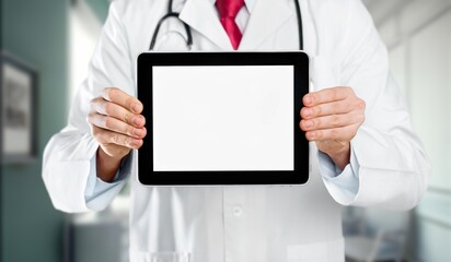 Fototapeta na wymiar Happy Doctor Holding Blank digital tablet