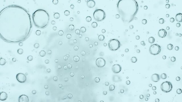 Top view closeup scene on chaotic moving pattern of bubble isolated on white background, texture of soda water when gas release, fizz medical drink from antacid pill, air of oxygen tank in diving