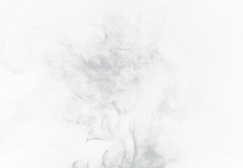 Obraz premium Grey smoke puff, white background and studio with no people with fog in the air. Smoking, smog swirl and isolated with smoker art from cigarette or pollution with graphic space for incense creativity