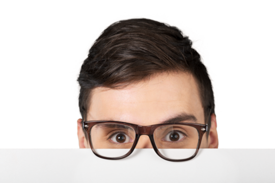 Man in glasses holding blank white paper over his face