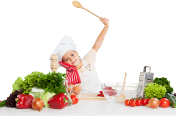 little cute chef holding wooden spoon with different pair of gloves looking at camera and smiling on gray background