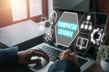 Computer science concept, Person working on laptop computer with computer science icon on virtual screen.