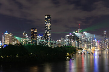 Brisbane city skyline at night with laser light show taken from Kangaroo Cliffs lookout
