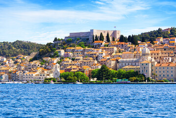 Fototapeta premium Sibenik, Croatia. UNESCO city of Sibenik architecture and coastline, Dalmatia, Croatia. Colorful historic town.