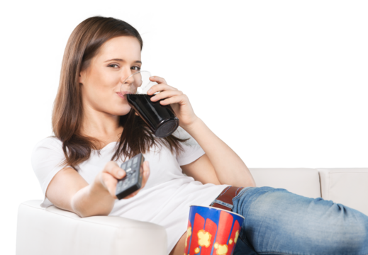 Woman holding remote controller and drinking cols isolated on white background