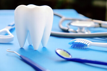Dental model and dental equipment on blue background, concept image of dental background. 